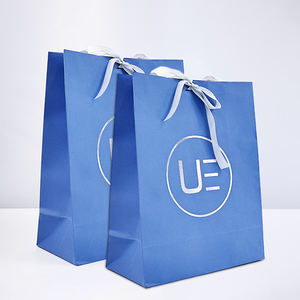 Di alta qualità di lusso sacchetto di carta Kraft nero <span class=keywords><strong>Shopper</strong></span> <span class=keywords><strong>per</strong></span> i vestiti negozio al dettaglio regalo di imballaggio con e nastro di lamina d'argento timbratura - Product Image 1