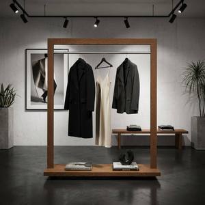 Expositor de Ropa Personalizado de Lujo en Madera y Metal con Superficie Electrochapada y Protección Contra la Corrosión para Tiendas de Ropa - Product Image 3