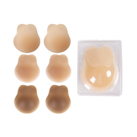 Couvre-mamelon de levage en forme de fleur d'oreille de lapin à double poussée mate en silicone solide avec emballage blister