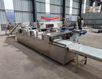 Ligne de production d'extrusion de barres énergétiques protéinées à base de céréales, de granola, de nougat, de bonbons au sésame, de cacahuètes croustillantes