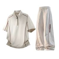 Ensemble de sport haut de gamme pour homme, nouveau style, coupe ouverte, léger et respirant, avec t-shirt demi-zip et pantalon, idéal pour l'été