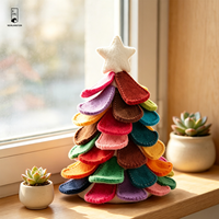 Décoration murale de Noël en feutre patchwork avec étoile superposée colorée et languettes décoratives