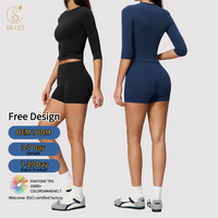 Nouvel ensemble de sport pour femme : haut respirant à séchage rapide et short taille haute pour le yoga et la gym, tenue de fitness sculptante