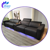 IEasy Schwarzes Rindsleder Verstellbare Kopfstütze Couch Relaxsessel Elektrischer Relaxsessel Ecksofa Elektrisches Relaxsofa-Set mit Tisch
