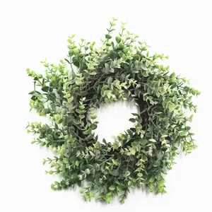 Outdoor Christmas wreath with pine needel pine cone and berry candle ring