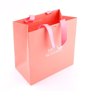 カスタムテイクアウトペーパーバッグ業界中国卸売高級ブティックピンク包装ギフトショッピングペーパーバッグ
