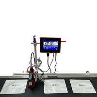 Imprimante jet d'encre thermique industrielle en ligne YAOMATEC 12,7 mm pour l'impression automatique de codes lots sur bouteilles en plastique et métaux