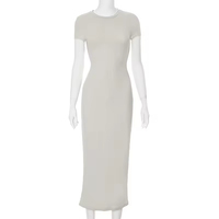 Vêtements pour femmes européennes et américaines, nouvelle mode, robe à manches courtes, couleur unie, col rond, coupe ajustée