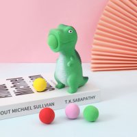 Jouet populaire pour enfants : Dinosaure interactif qui serre et lance la balle
