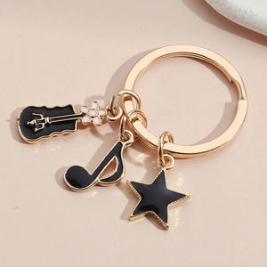 Nuevo y Popular Llavero Colgante para Bolso con Diseño de Notas Musicales, Fonógrafo, Teclado, Auriculares, Micrófono, Piano, Violín y Banda - Product Image 3
