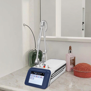 Dispositivo de eliminación de cicatrices de rejuvenecimiento de la piel vertical con láser fraccional de CO2 de alta resistencia 10600nm Aplicación vaginal Compatible con EE. UU. AU - Product Image 1