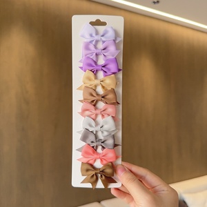 Lot de 10 pinces à cheveux promotionnelles pour bébés, nœuds en ruban de couleur unie, faits à la main pour petites filles - Product Image 2