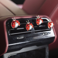 Diffuseur d'aromathérapie pour voiture, clip de parfum pour grille d'aération, en alliage, motif coccinelle sept étoiles tendance et mignonne, pour voiture électrique