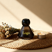 Bouteilles de diffuseur d'aromathérapie rondes personnalisées de 100 millilitres pour la décoration de la maison ; Bouteilles de diffuseur en verre parfumé de 4 onces
