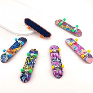 Jouets anti-stress : Mini skateboards à doigts en plastique, skateboards à doigts pour enfants, ensemble populaire - Product Image 1