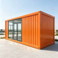 Maisonnette Apple en acier ondulé orange, conteneur habitable avec mur entièrement vitré, double porte, mobilée pour bureau et espace de vie