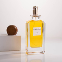 Flacon de parfum en verre transparent rectangulaire minimaliste de 85 ml avec vaporisateur et bouchon en bois, vente en gros personnalisée