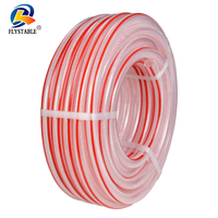 Tuyau en PVC avec tresse textile couvrant une large gamme d'applications industrielles pour le transport de divers fluides