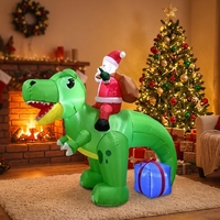 Père Noël gonflable lumineux sur un Tyrannosaurus Rex vert avec boîte cadeau pour la décoration de jardin, boutique, festival, exposition
