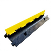 Protecteur de câble de sol routier robuste 1 canal en caoutchouc jaune et noir + PVC pour la protection des fils