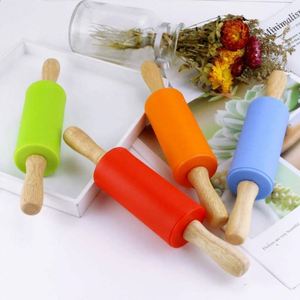 Custom Kitchen Gadgets 2024 Kids Mini Medium Large Size Chsristmas Embossed <b>Silicone</b> Solid Wood Rolling Pin for Baking - Product Image 1