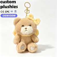 Llavero de peluche de oso de peluche personalizado a precio de fábrica, colgante de oso esponjoso con lazo de doble cara para decoración de mochilas y regalo
