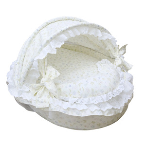 Cama para mascotas con forma de nido redondo, estampada, de fibra de poliéster, talla única, con dosel y lazo, transpirable para las cuatro estaciones. - Product Image 1