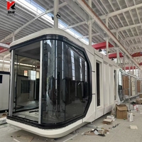 Maison de navire préfabriqué Paquet plat Maisons de capsule mobiles Maison prête à l'emploi Maison Structure en acier Famille d'accueil Capsule spatiale détachable