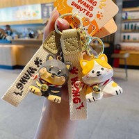 Porte-clés chien en résine Kawaii, breloque de sac chiot assis avec clochette, pendentif animal en résine Kawaii