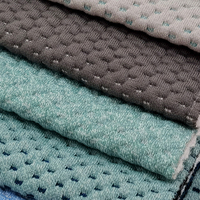 Tissu de revêtement de matelas matelassé en textile de décoration de canapé doux et élastique en tricot 100% polyester