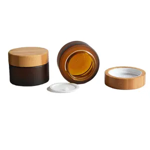 50g wadah kosmetik kaca Amber beku, botol krim kosmetik isi ulang dengan tutup bambu dan lapisan dalam