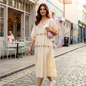 Vestido midi amarillo con bordado y mangas abullonadas, estampado floral para mujer, con tela ligera, estilo moderno y ajuste cómodo. - Product Image 1