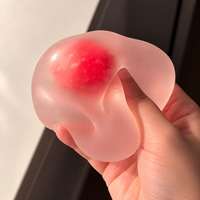 Jouet anti-stress en TPR translucide rose en forme de fraise Mochi pour enfants