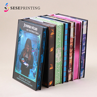 Impression de livres reliés en édition spéciale avec bords estampillés pour les romans fantastiques et romantiques, sur mesure OEM