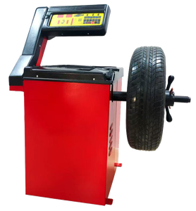 Équilibreuse de pneus haute performance, rapide et silencieuse, pour ateliers de réparation automobile, magasins de pneus et garages. - Product Image 1