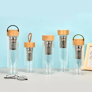 Bottiglia d'acqua shaker in vetro a doppia parete trasparente borosilicato da 400ml di vendita calda con coperchio in bambù