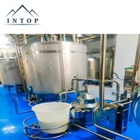 Petite centrifugeuse à disques pour la séparation du lait écrémé, avec capacité de séparation en deux phases