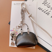 Sac à accessoires de créateur à suspendre, mini sac moderne en cuir PU, breloque de sac, petit sac coquille exquis de haute qualité, porte-clés de sac de luxe