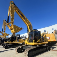 Excavatrice sur chenilles hydraulique Komatsu PC210LC d'occasion, 21 tonnes, d'origine japonaise, pour travaux de terrassement, carrière et démolition, avec moteur et engrenages.
