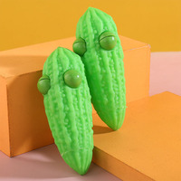 Jouets tendance pour enfants Jincan : Nouveaux jouets à presser en PVC en forme de melon amer pour enfants