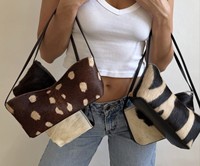 Fournisseur en gros de sacs à main en cuir véritable pour femmes, en poils de veau, fabriqués sur mesure en usine OEM