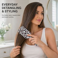 Brosse à cheveux en gros à imprimé léopard, brosse démêlante à coussin d'air pour massage du cuir chevelu pour femmes, logo personnalisé OEM ODM pour salon de coiffure