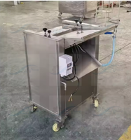 Machine à éplucher les poissons en promotion : Éplucheuse automatique de peau de calmar et de saumon
