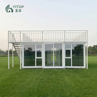Maison conteneur d'expédition blanche personnalisée à toit plat extensible avec balcon, 20 pieds, préfabriquée, modulaire, pour jardin et cour