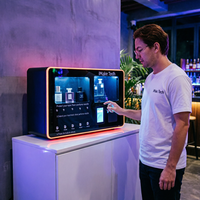 Distributeur de parfums mural en métal avec écran tactile et options de paiement multiples pour aéroports et centres commerciaux