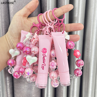 Gloss à lèvres en gros, marque privée, parfum, porte-clés, pompon, gloss à lèvres huileux, repulpeur, transparent, végan, gloss à lèvres pour enfants, porte-clés