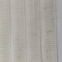 Bande antidérapante en silicone perforée à points, thermocollante, pour le cyclisme, les shorts de sport et les revers de manches (OEM/ODM)