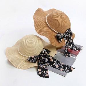 Wholesale Casual <b>Straw</b> <b>Hat</b> for Women Sun protection Outdoor Travel Seaside Beach Pearl Bow Sun <b>Hat</b> - Product Image 1