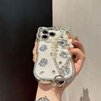 Coque de téléphone 3D chat dessin animé scintillant avec diamants, étui de protection en cristal pour iPhone 13 14 15 16 17 Pro Max avec bracelet