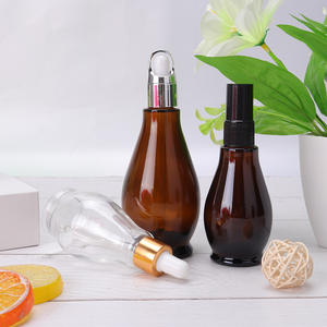 Vente en gros flacon compte-gouttes cosmétique ambré de luxe de 100ml contenants cosmétiques pour soins de la peau et emballage bouteille en verre d'huile marocaine - Product Image 4